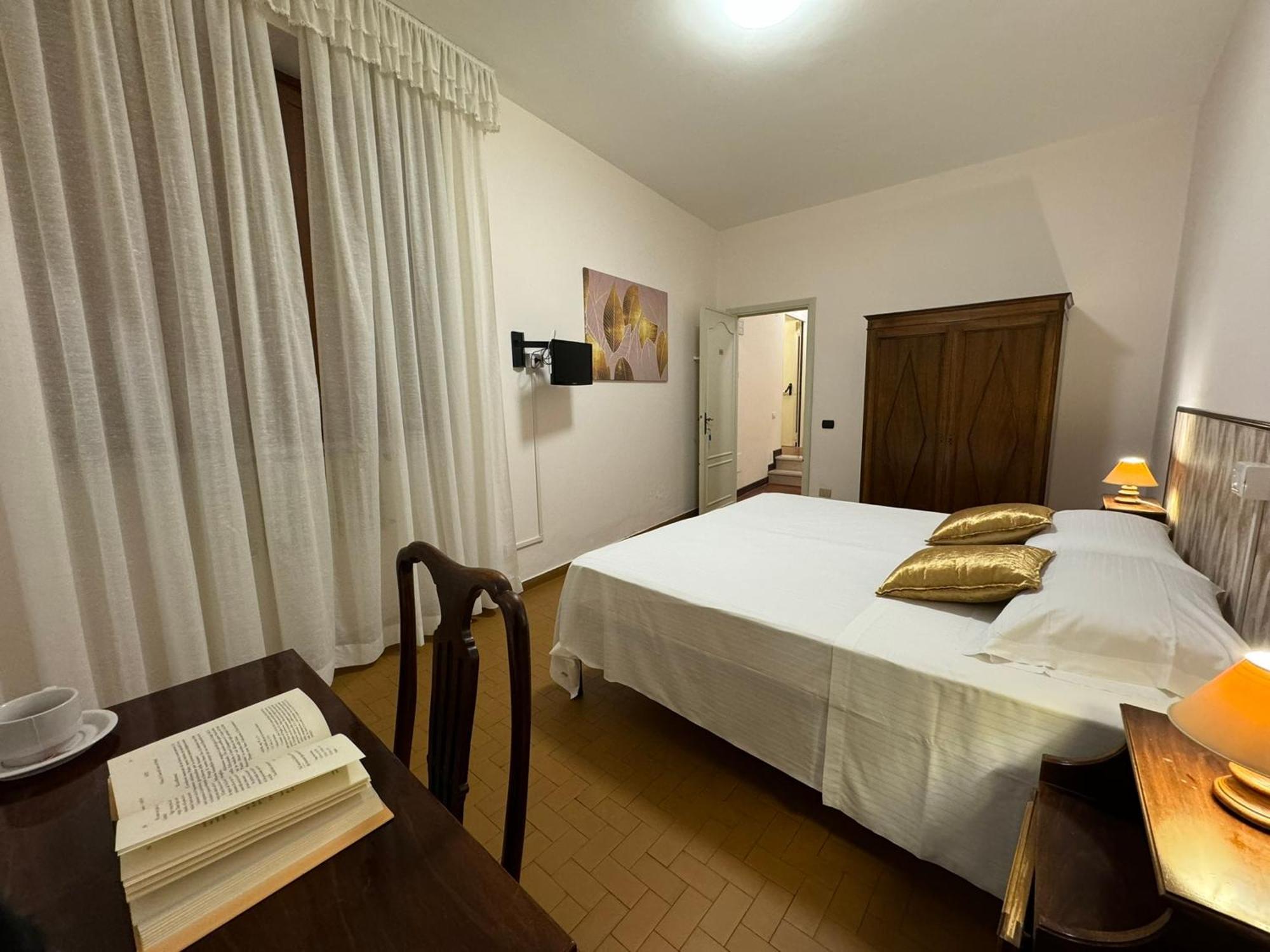 מלון טודי Monastero Ss. Annunziata חדר תמונה A bedroom in Italy